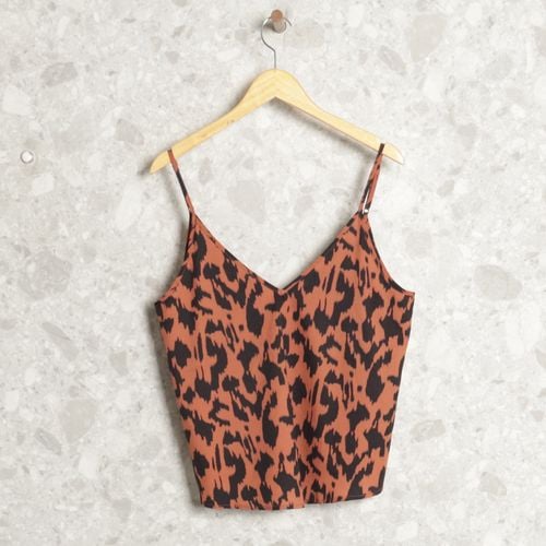 blusa terracota abstrata 136842024?action_source=75241&ref=home_home&rsp=1&rspix=1