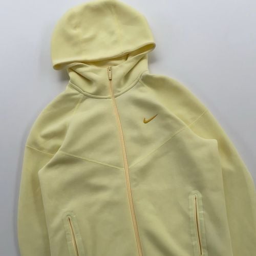 nike tech fleece nocta amarela p 150301602?action_source=75473&ref=home_home&rsp=1&rspix=1