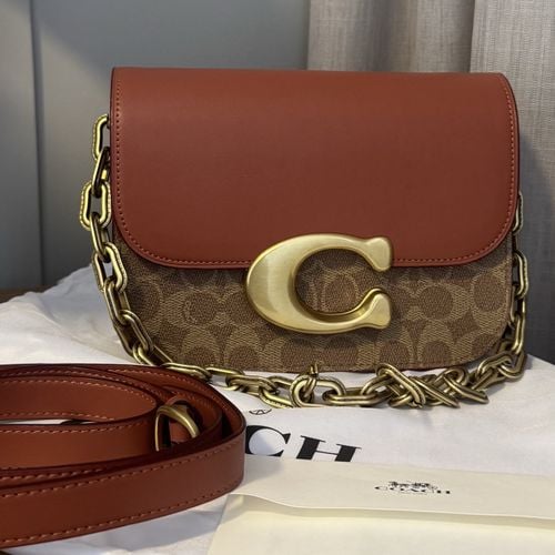 bolsa coach idol signature marrom 138433160?action_source=68872&ref=home_home&rsp=1&rspix=1
