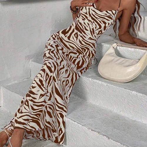 vestido longo com estampa de zebra 133374657?action_source=66695&ref=home_home&rsp=1&rspix=1