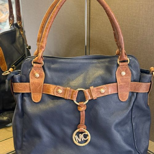 bolsa miriam castro couro azul marinho 150212738?action_source=64648&ref=home_home&rsp=1&rspix=1