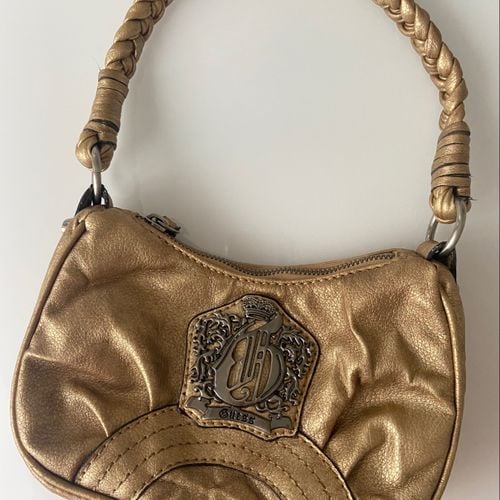 bolsa guess dourada em couro legitimo 124637144?action_source=77090&ref=home_home&rsp=1&rspix=1