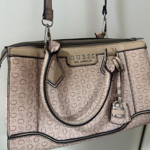 bolsa guess rosa claro 143576915?action_source=76594&ref=home_home&rsp=1&rspix=1