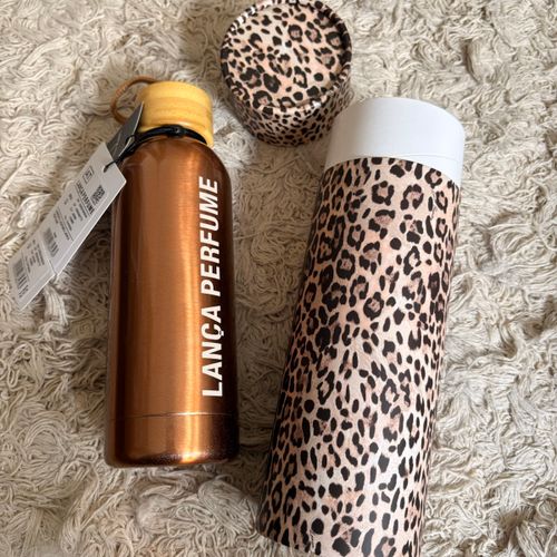 garrafa lanca perfume inox dourada 150947097?action_source=72470&ref=home_home&rsp=1&rspix=1