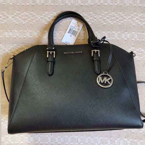 bolsa michael kors 136446908?action_source=67884&ref=home_home&rsp=1&rspix=1