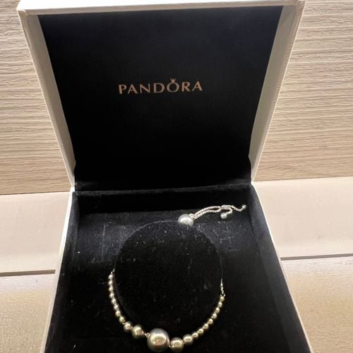 pulseira pandora gravatinha prata 149470038?action_source=67326&ref=home_home&rsp=1&rspix=1