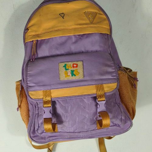 mochila luluca roxo claro laranja 132850058?action_source=66794&ref=home_home&rsp=1&rspix=1