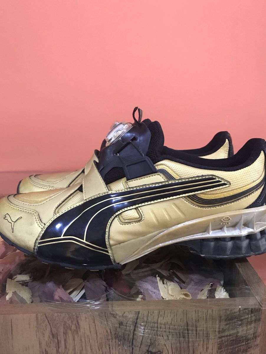 Puma on sale disc dourado