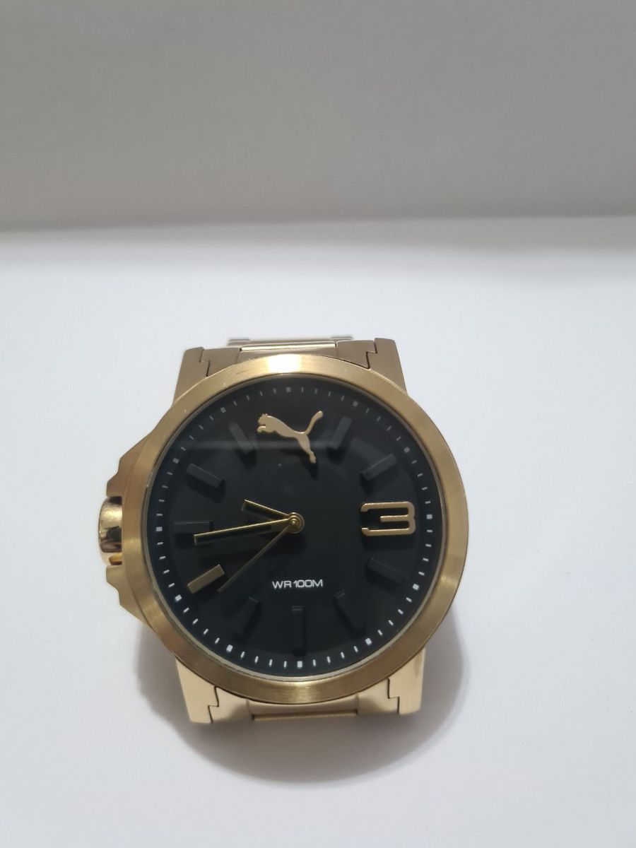 Relogio puma best sale dourado masculino