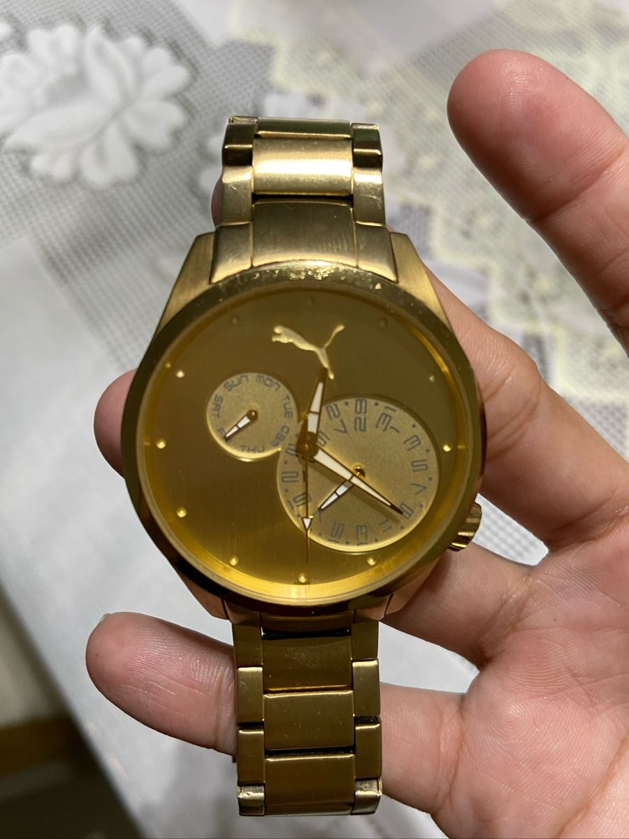 relogio puma dourado original