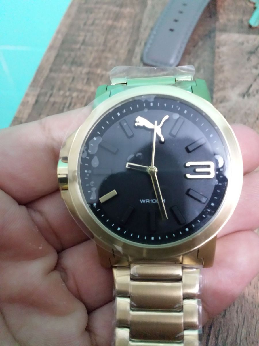 relogio puma dourado original