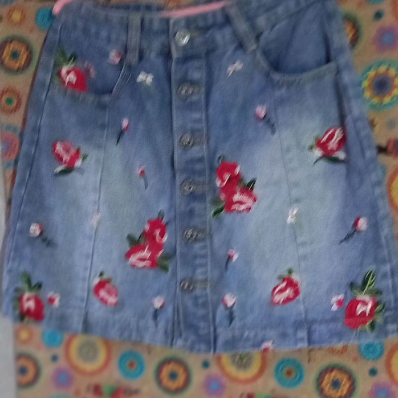 Saia jeans hot sale bordada com flor