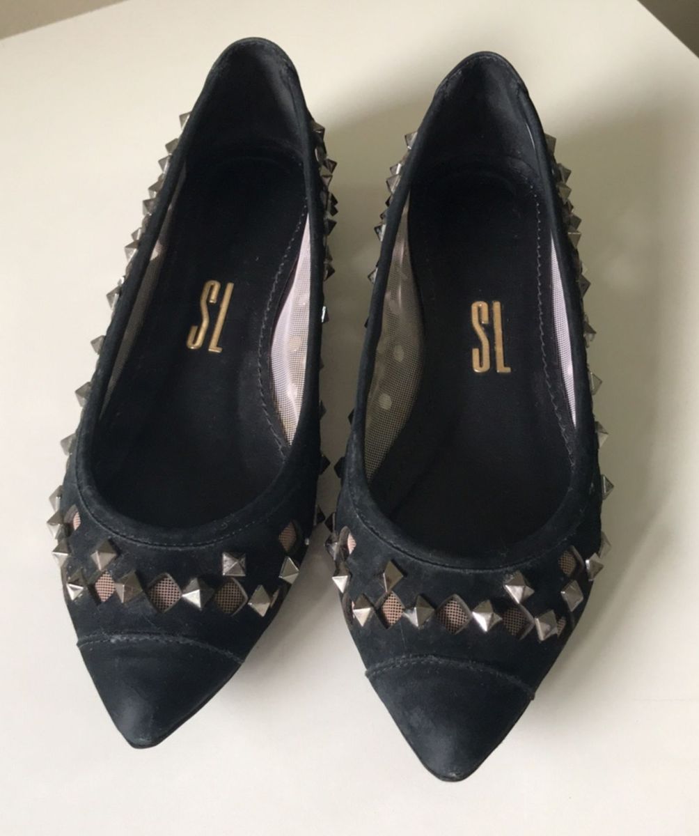 sapatilha preta e branca santa lolla