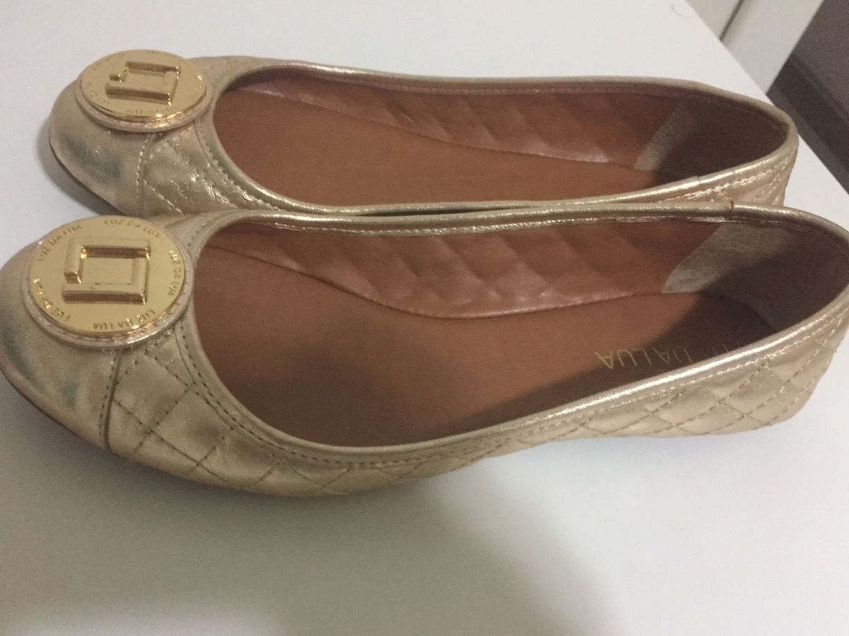 sapatilha dourada luz da lua