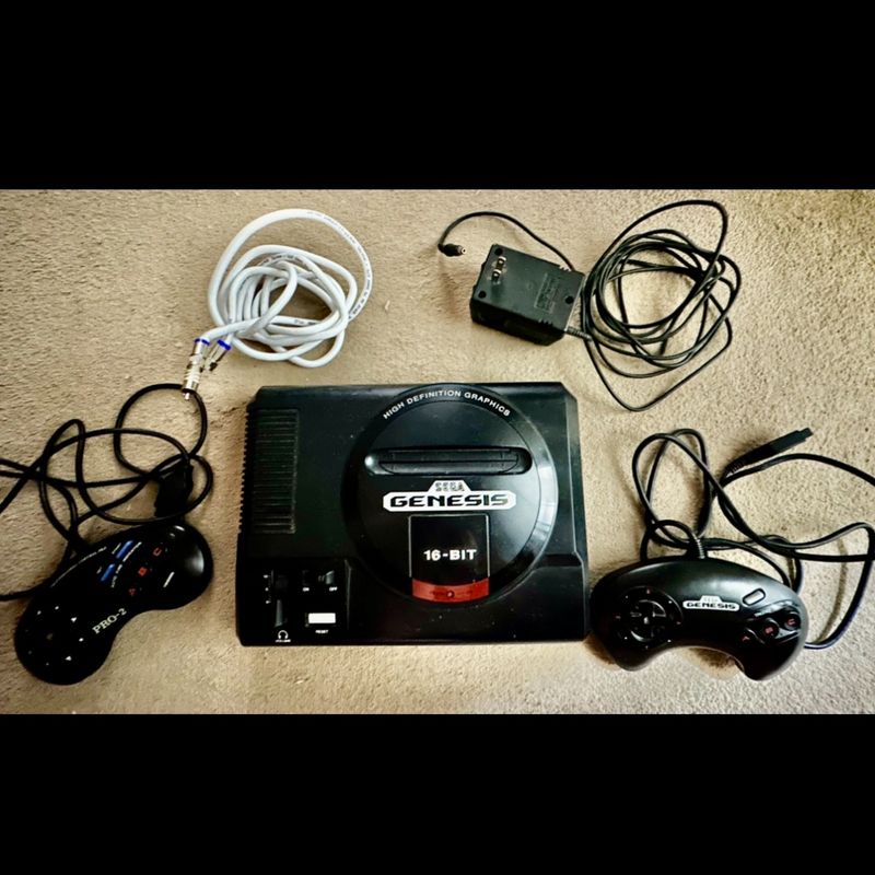 Purchases Sega Genesis Console