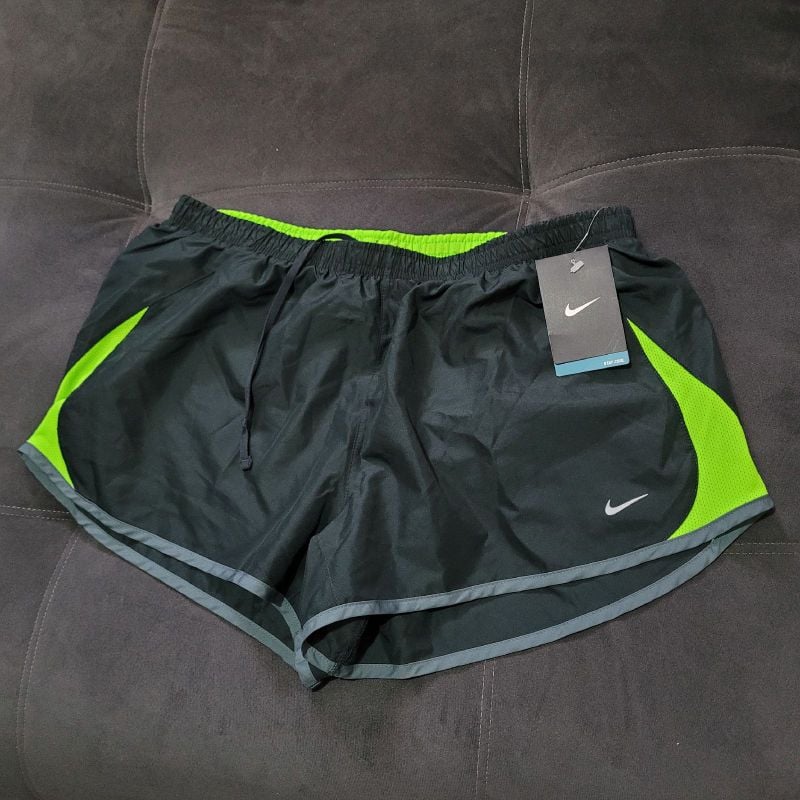 Black and lime store green nike shorts