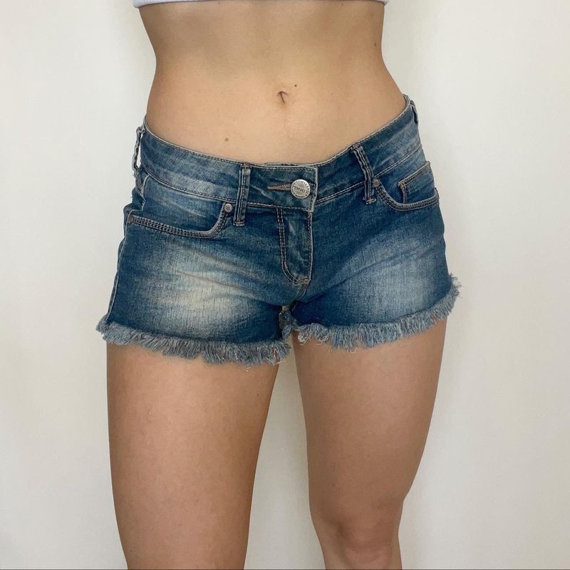 Mini short store jeans cintura baixa