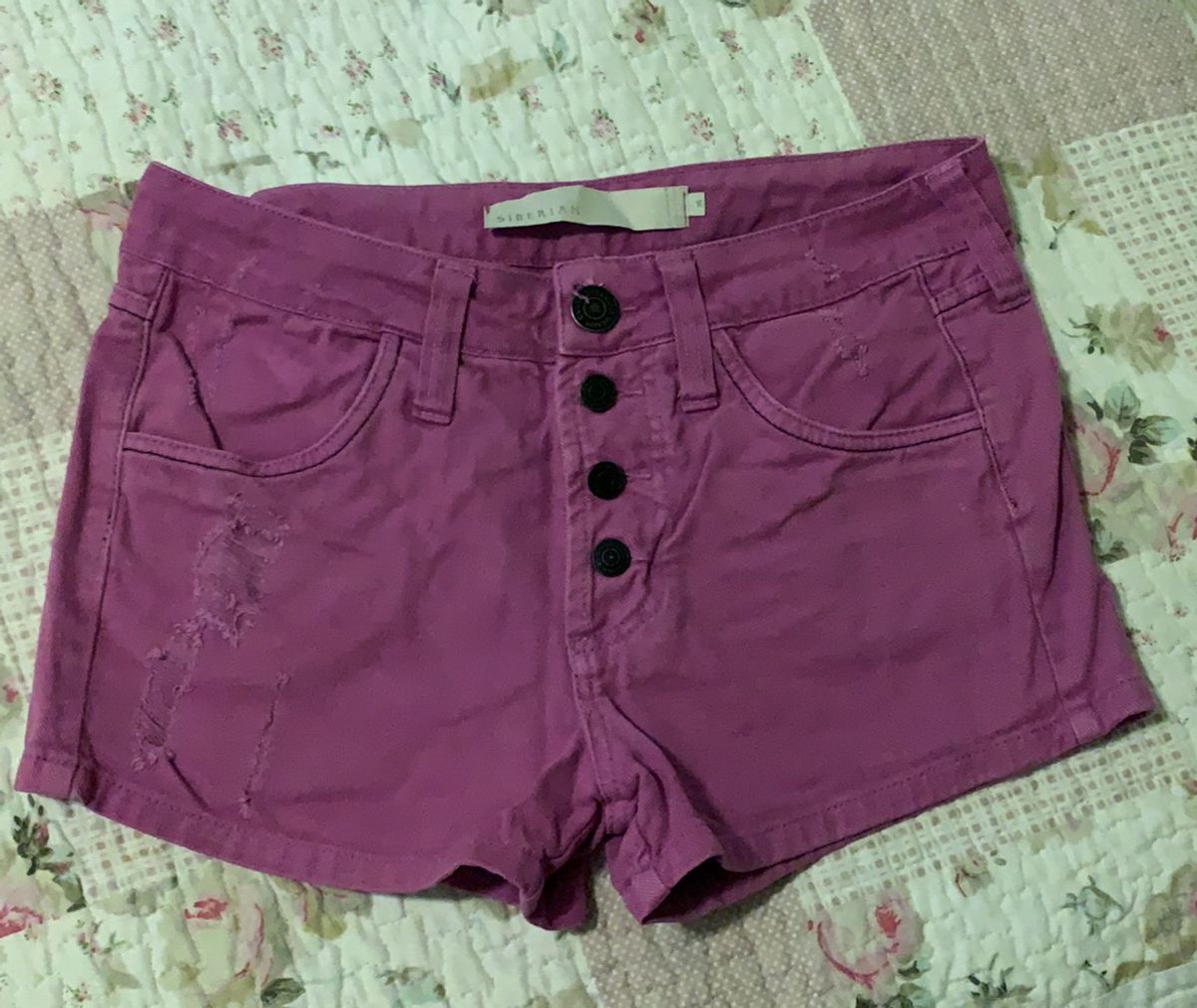 short jeans roxo