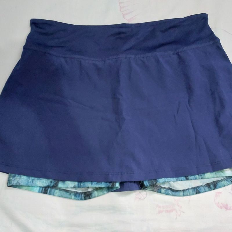 Short saia academia store marisa