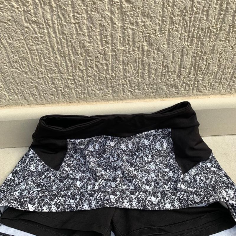 Short saia academia store marisa