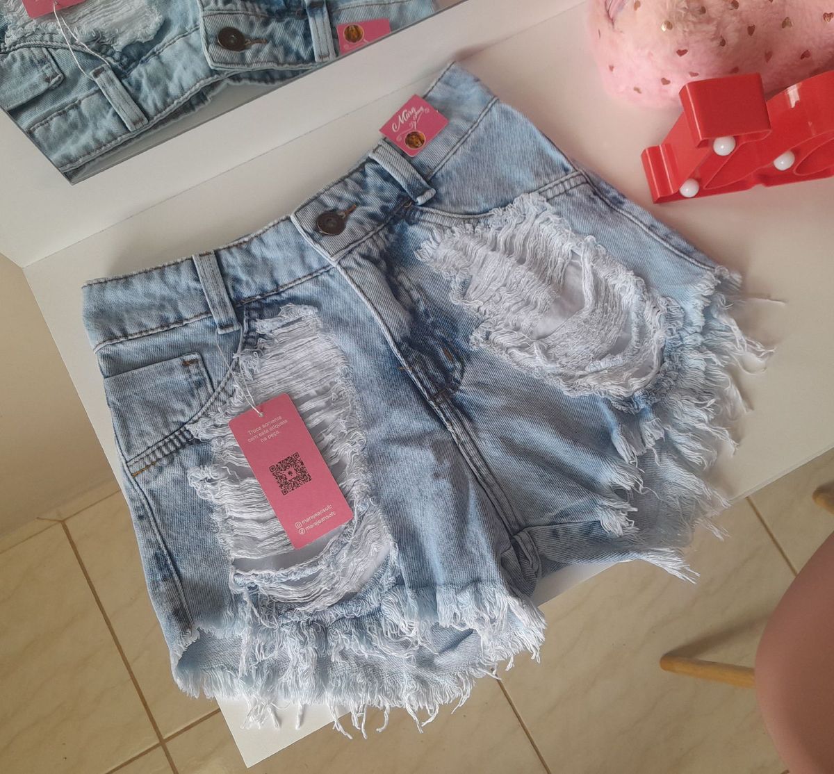 Shorts jeans best sale rasgadinho cintura alta