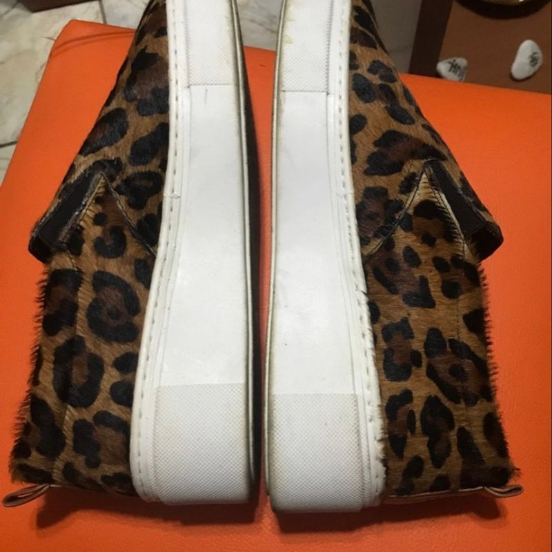 Slip on best sale arezzo onça