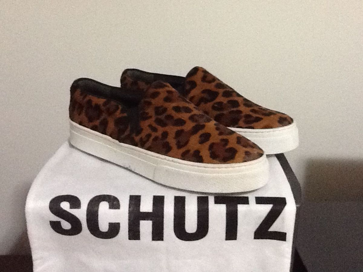 slip on schutz onça