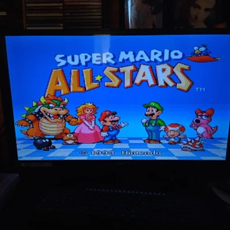 Jogo Super Mario All Stars + Super Mario World Original - SNES - Sebo dos  Games - 10 anos!