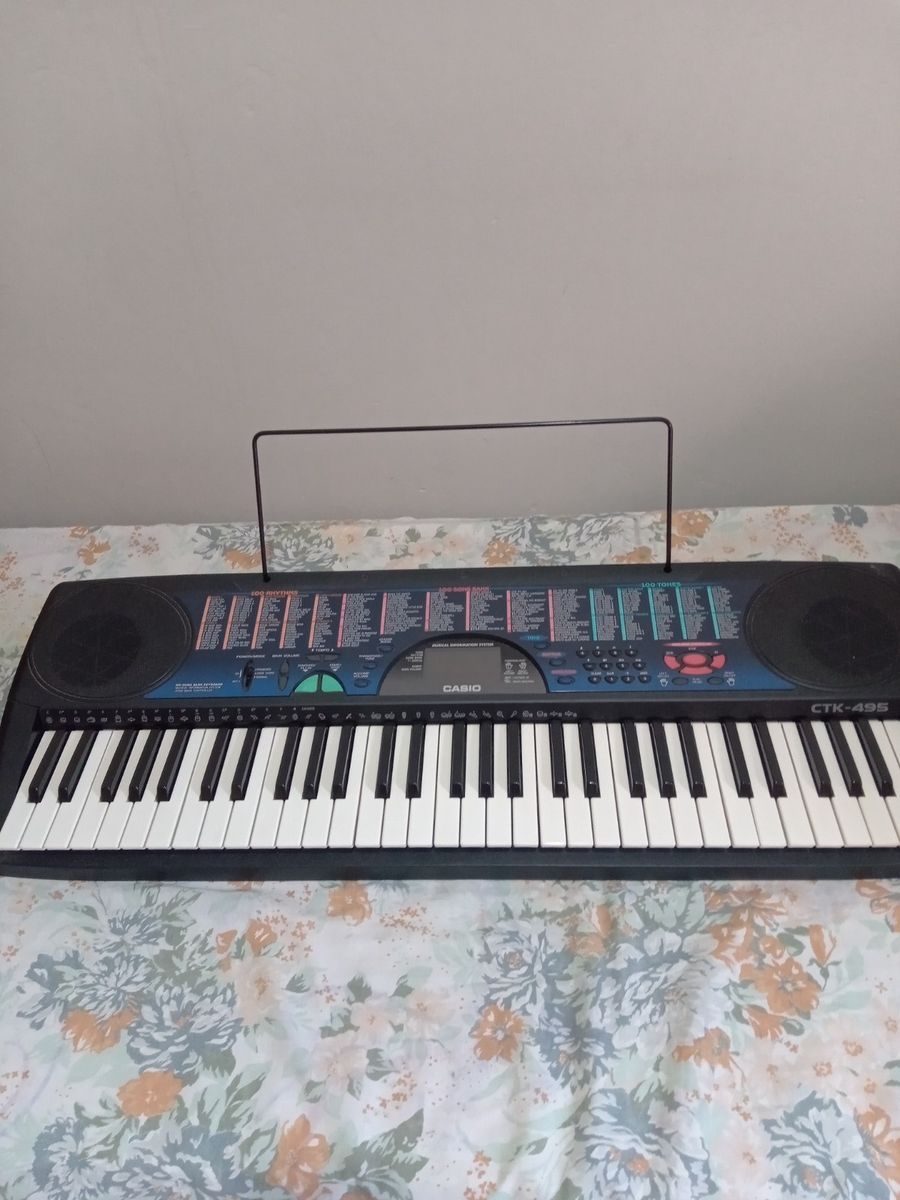 Piano casio ctk 495 hot sale