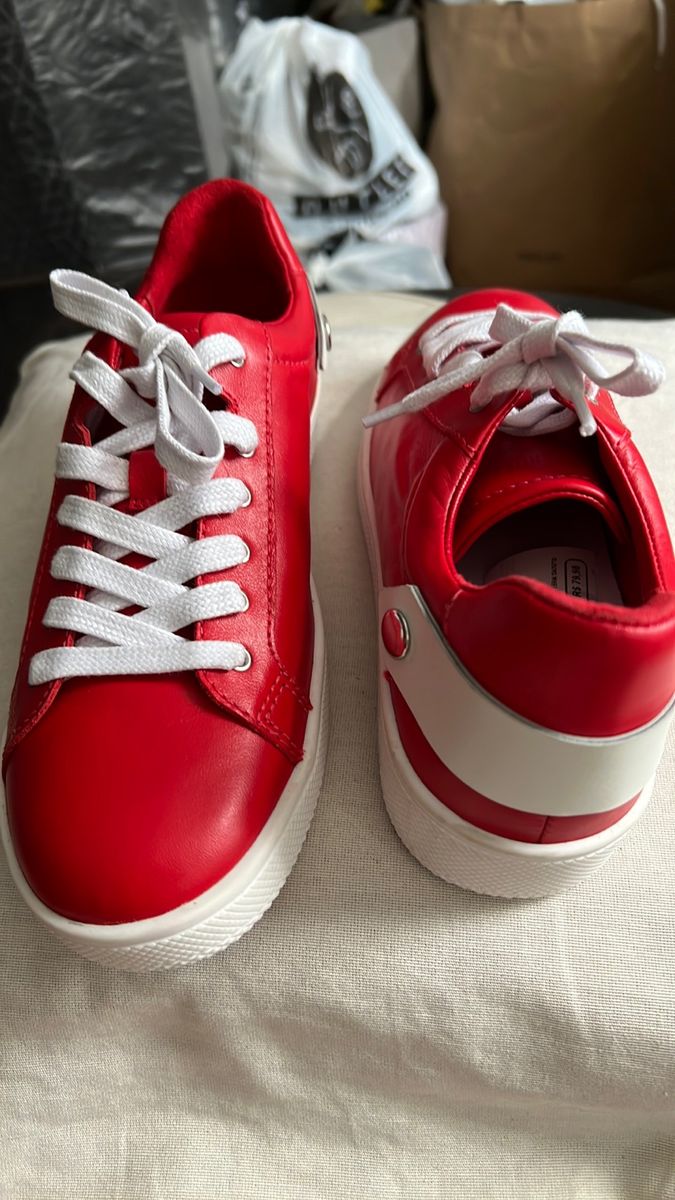 Tenis store vermelho schutz