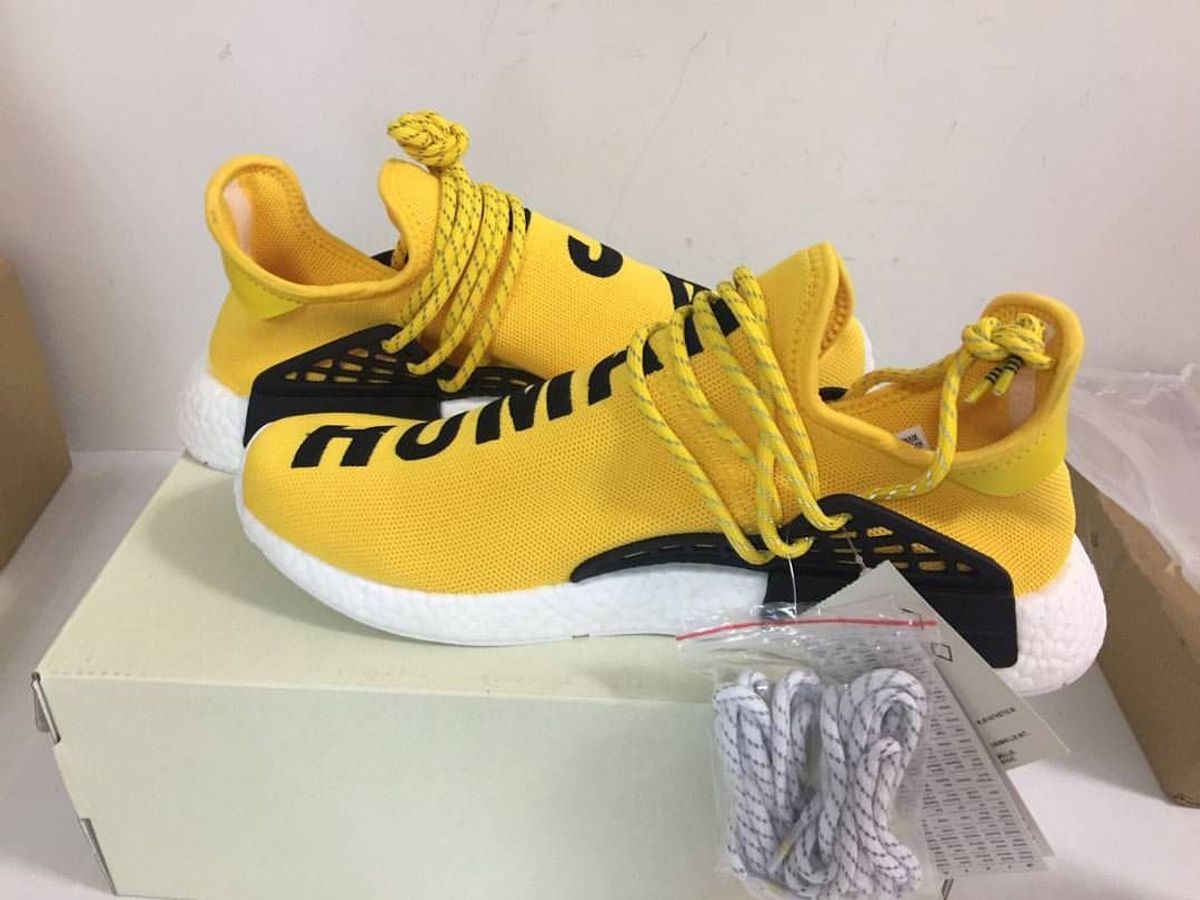 adidas human race amarelo