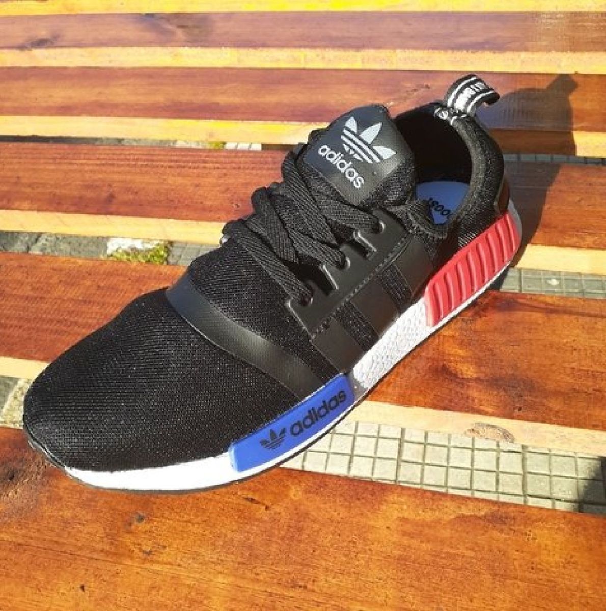 nmd preto e azul