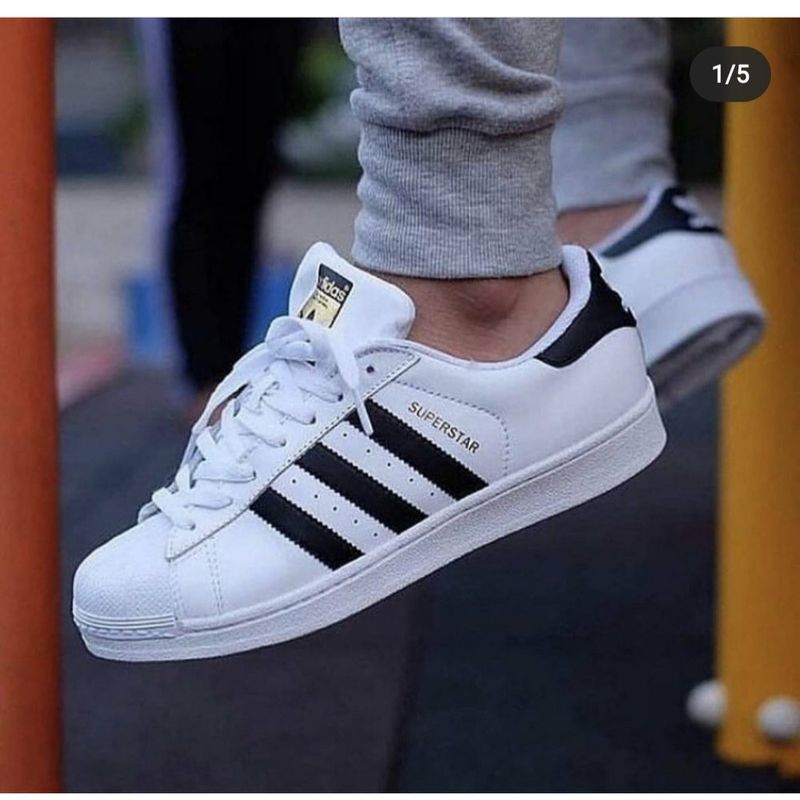 Tenis adidas hot sale com listra