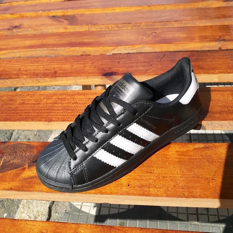 Adidas star outlet preto