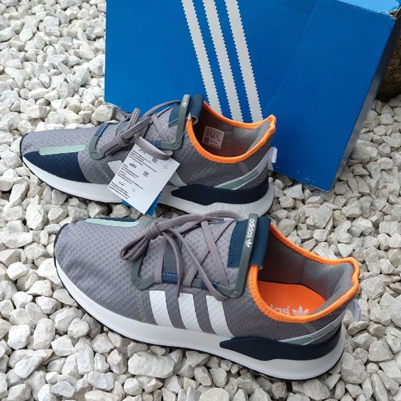 Tenis adidas best sale cinza com laranja