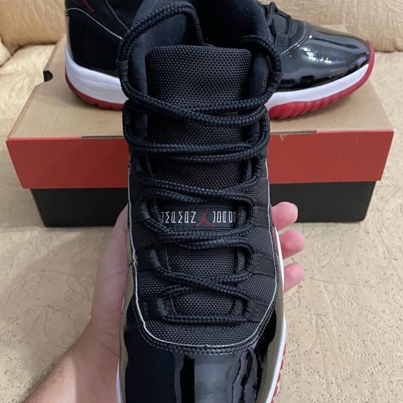 Store Jordan 11 bred