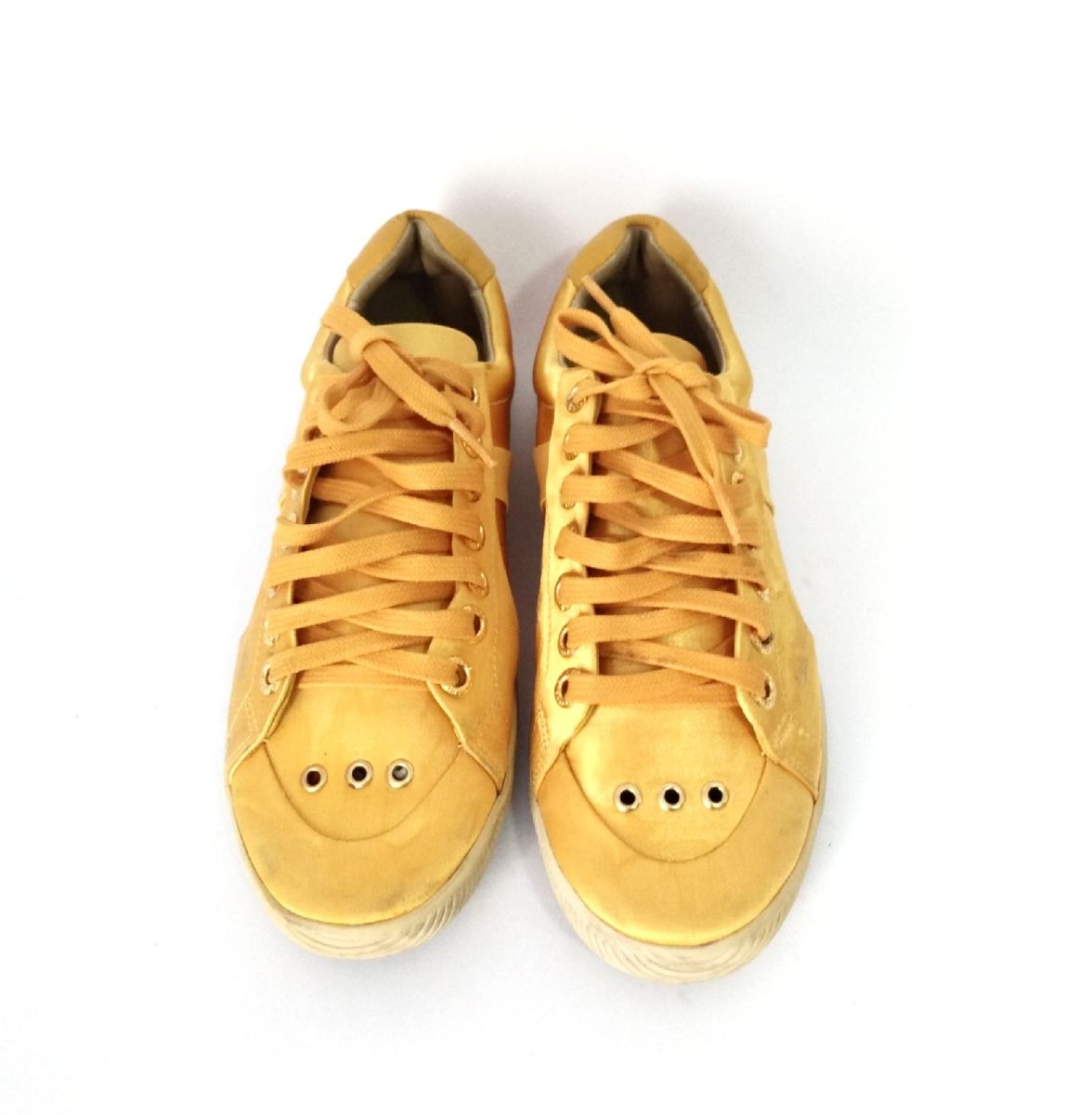 tenis osklen amarelo