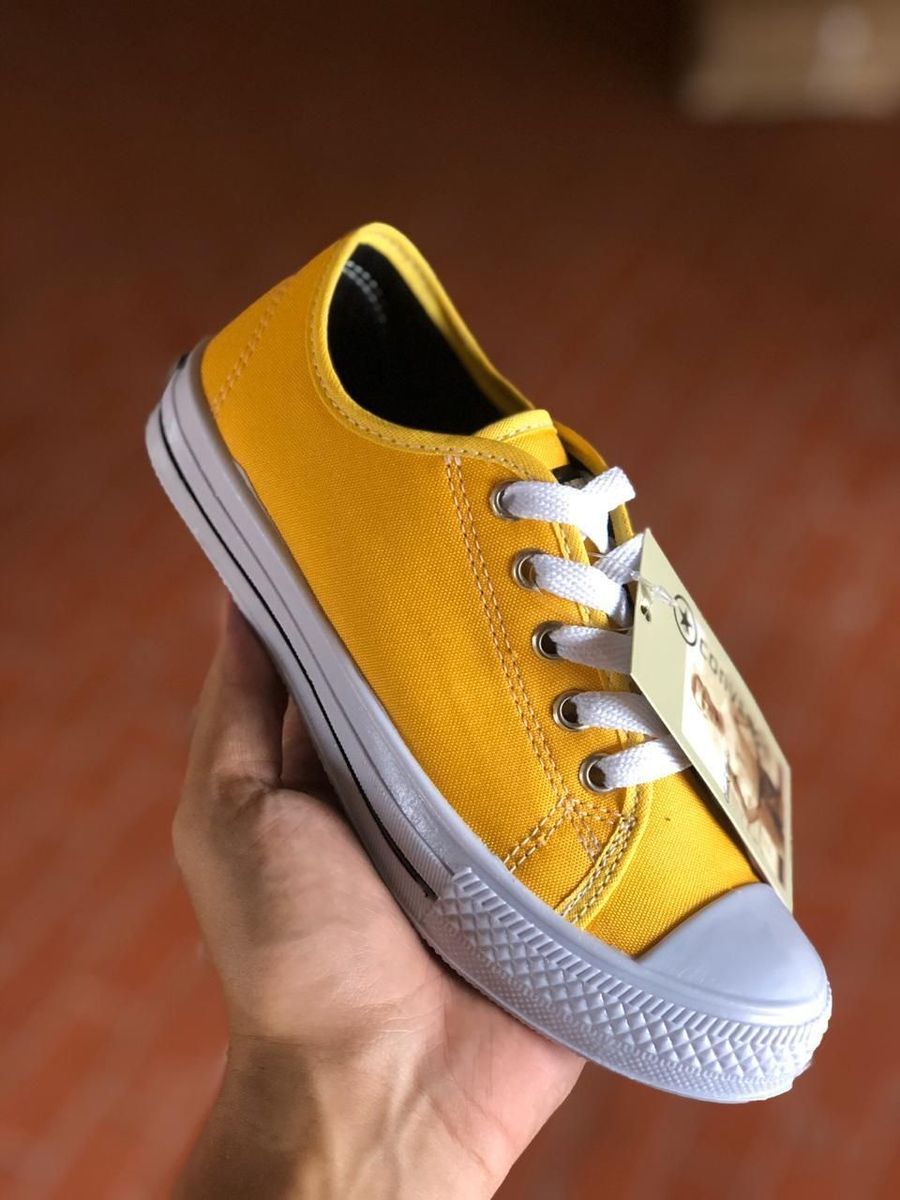 converse amarelo cano baixo