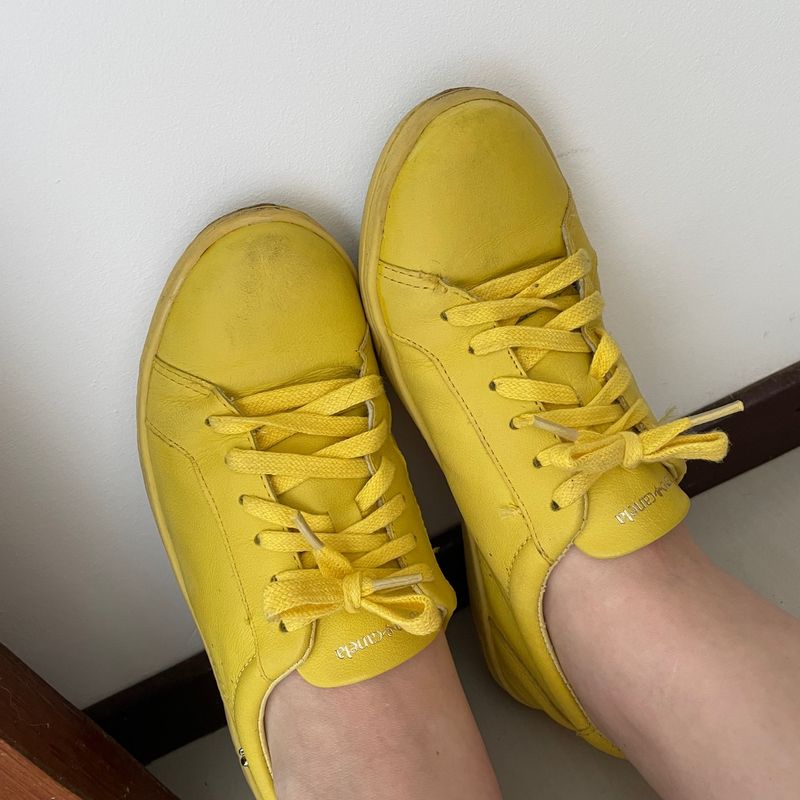 Tenis cravo e canela clearance amarelo