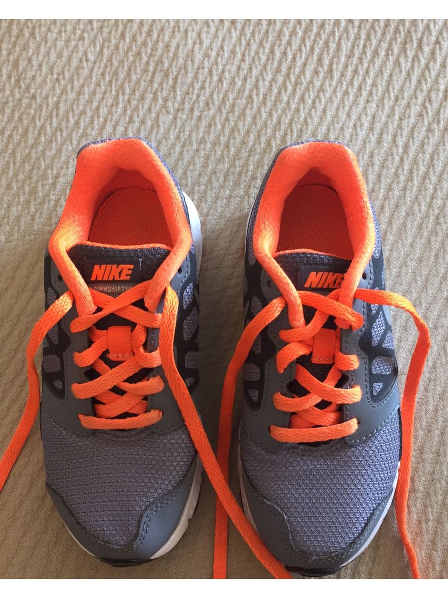 cadarço laranja nike