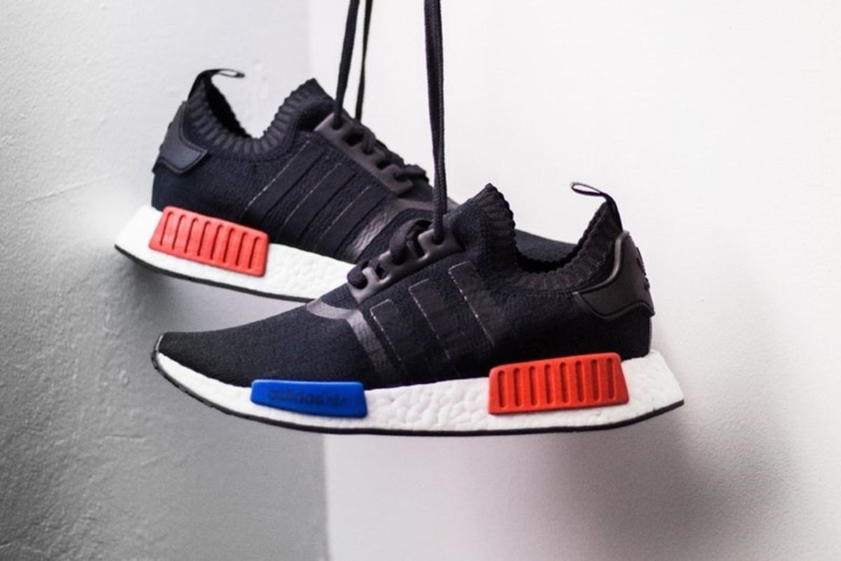 nmd preto vermelho e azul