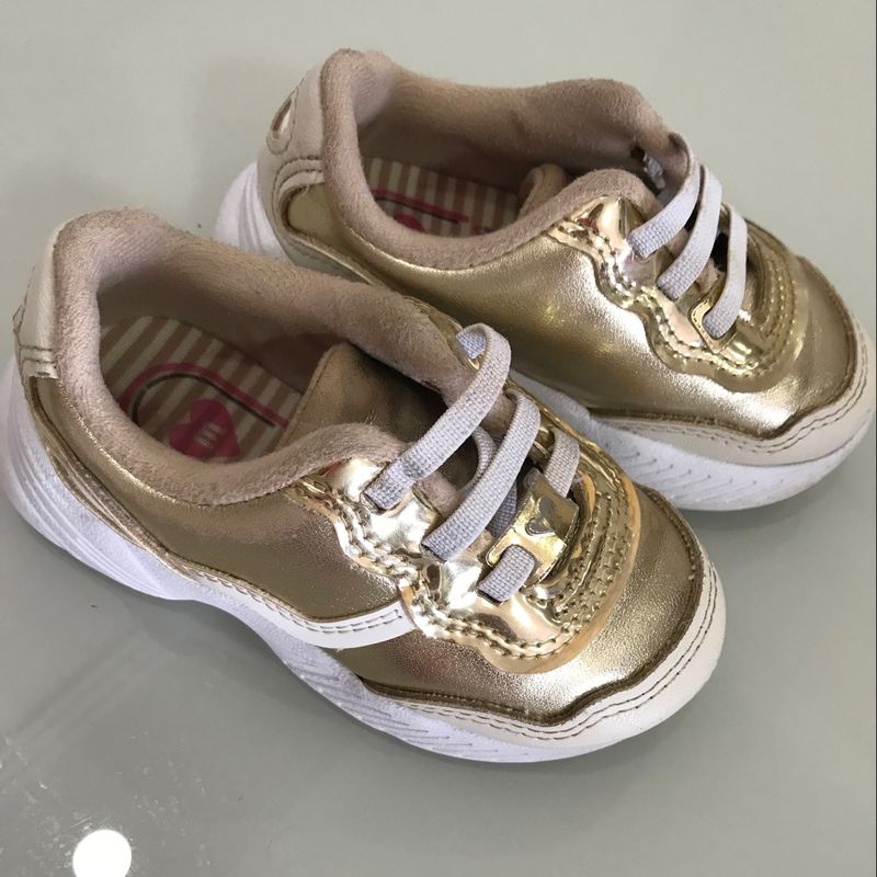 Tenis best sale dourado molekinha