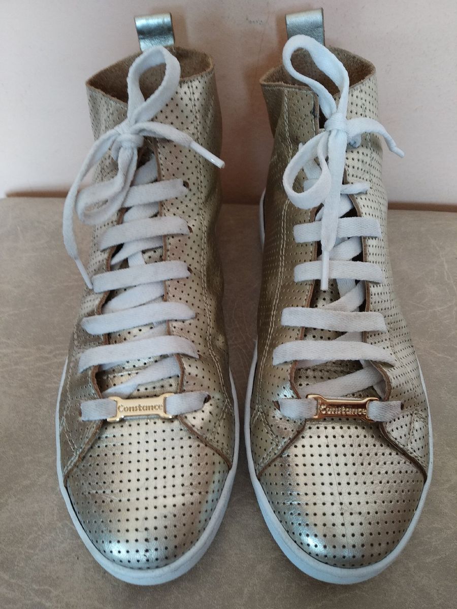 tenis dourado constance