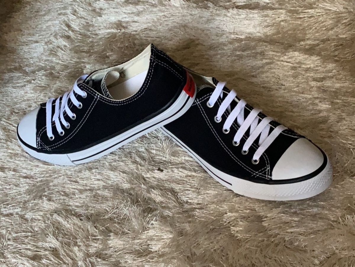 tenis skavator antigo