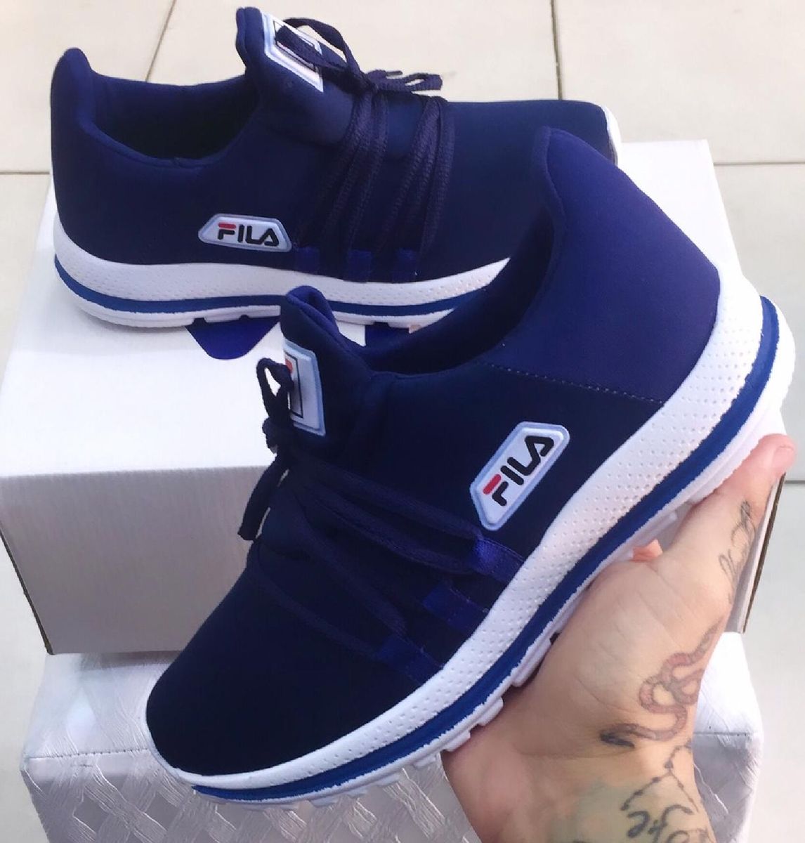 Modelo de tênis da hot sale fila