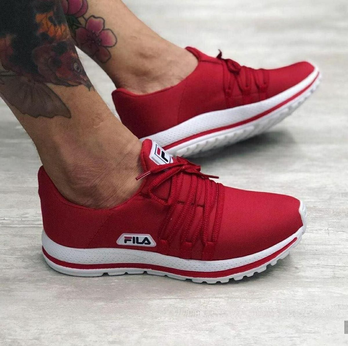 tenis fila masculino preto e vermelho