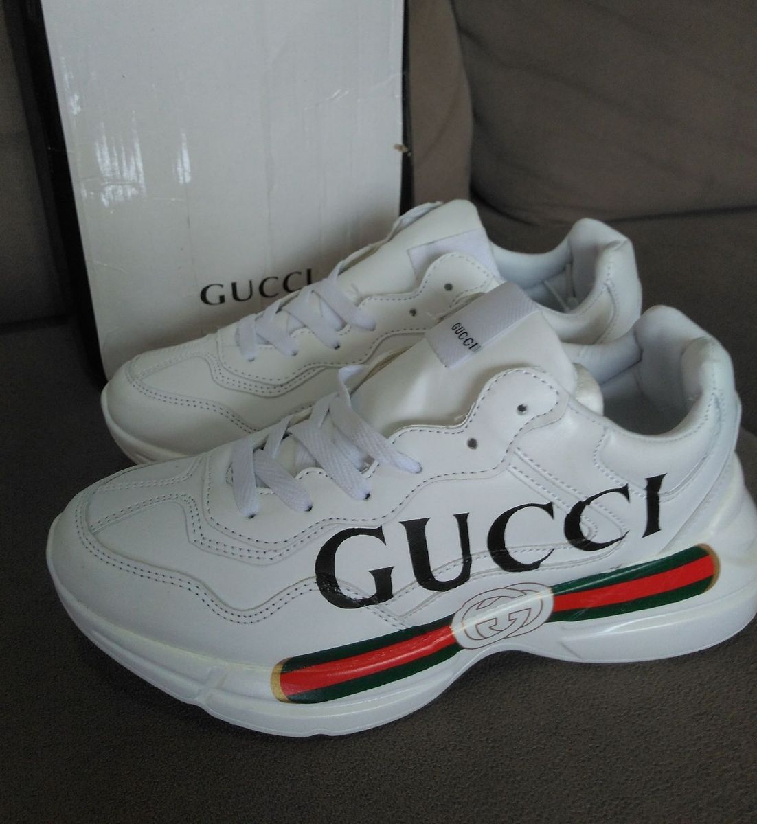 tenis gucci masculino rhyton