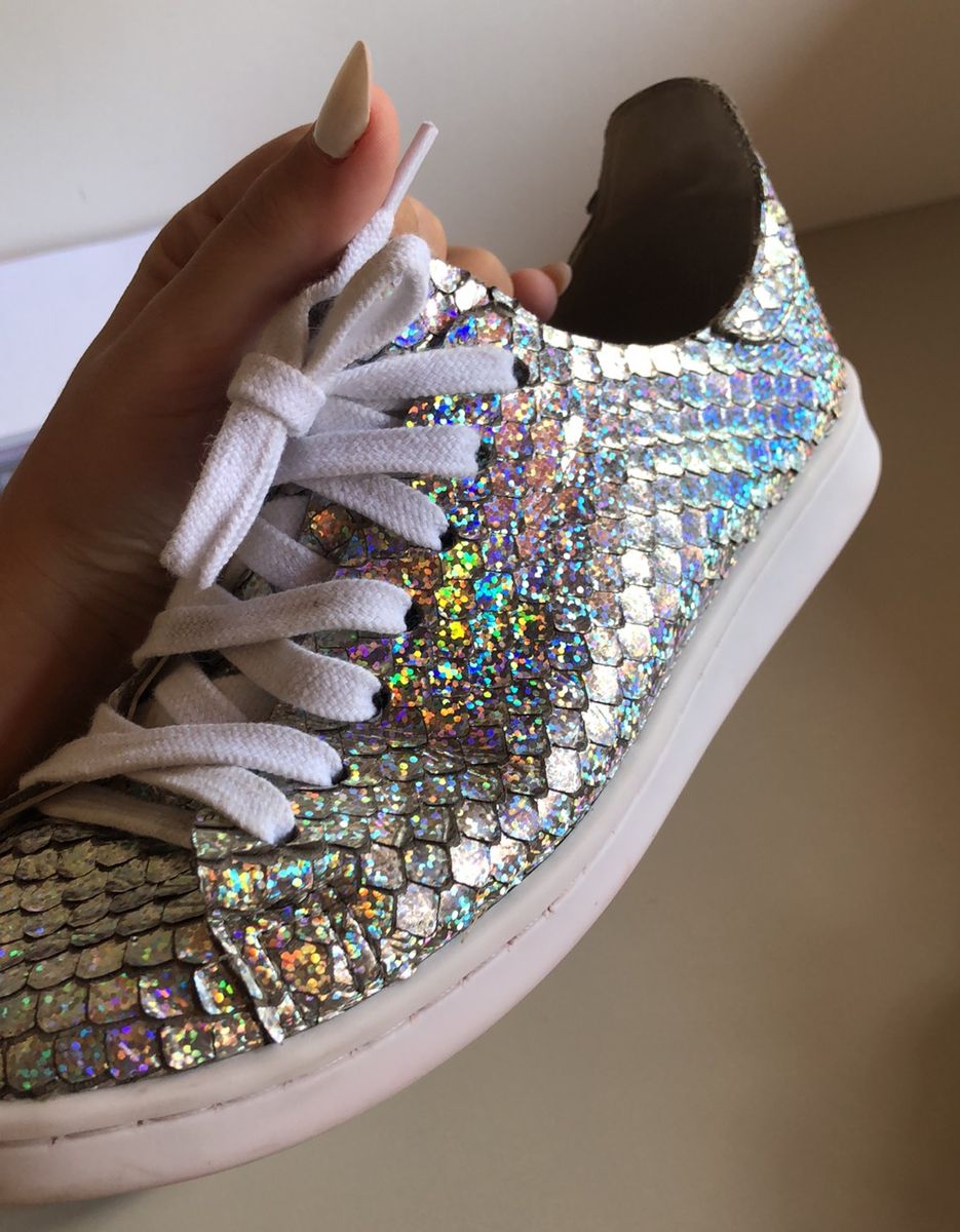 tenis holografico schutz