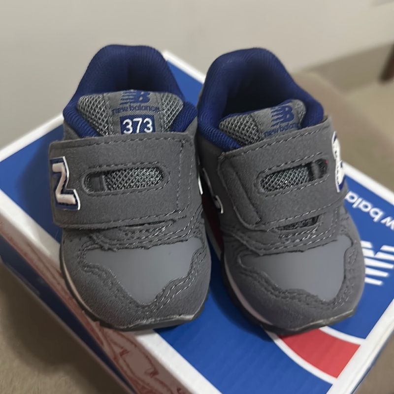 New balance infantil outlet azul marinho