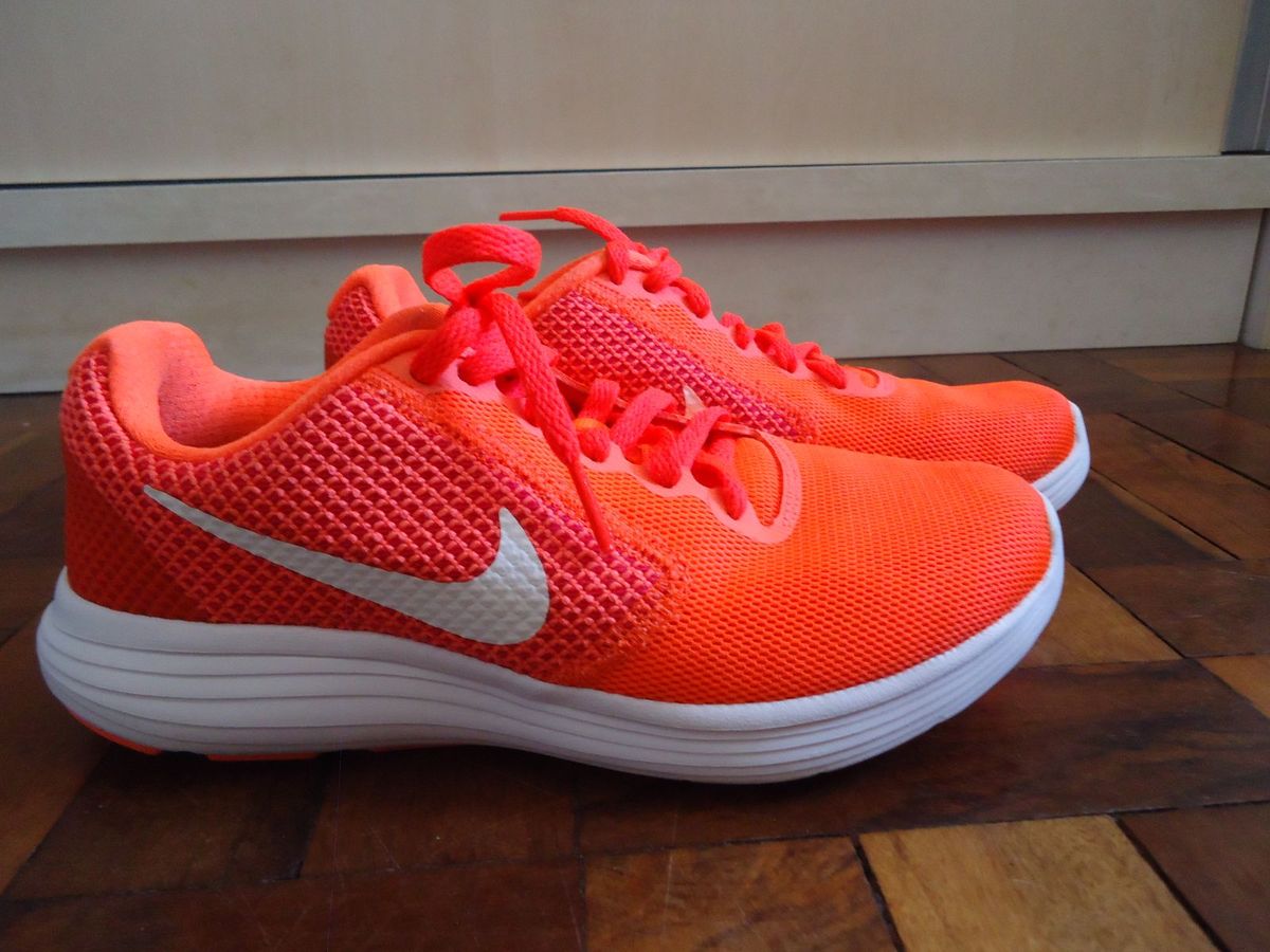 tenis nike running feminino laranja